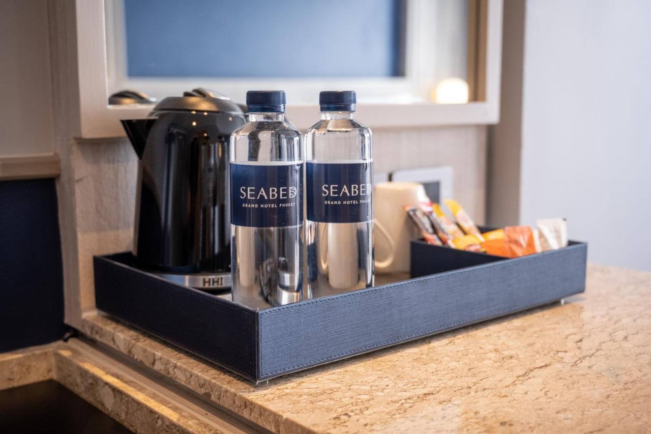 Seabed Grand Hotel Phuket - Sha Extra Plus Exteriör bild SeaBear water bottles