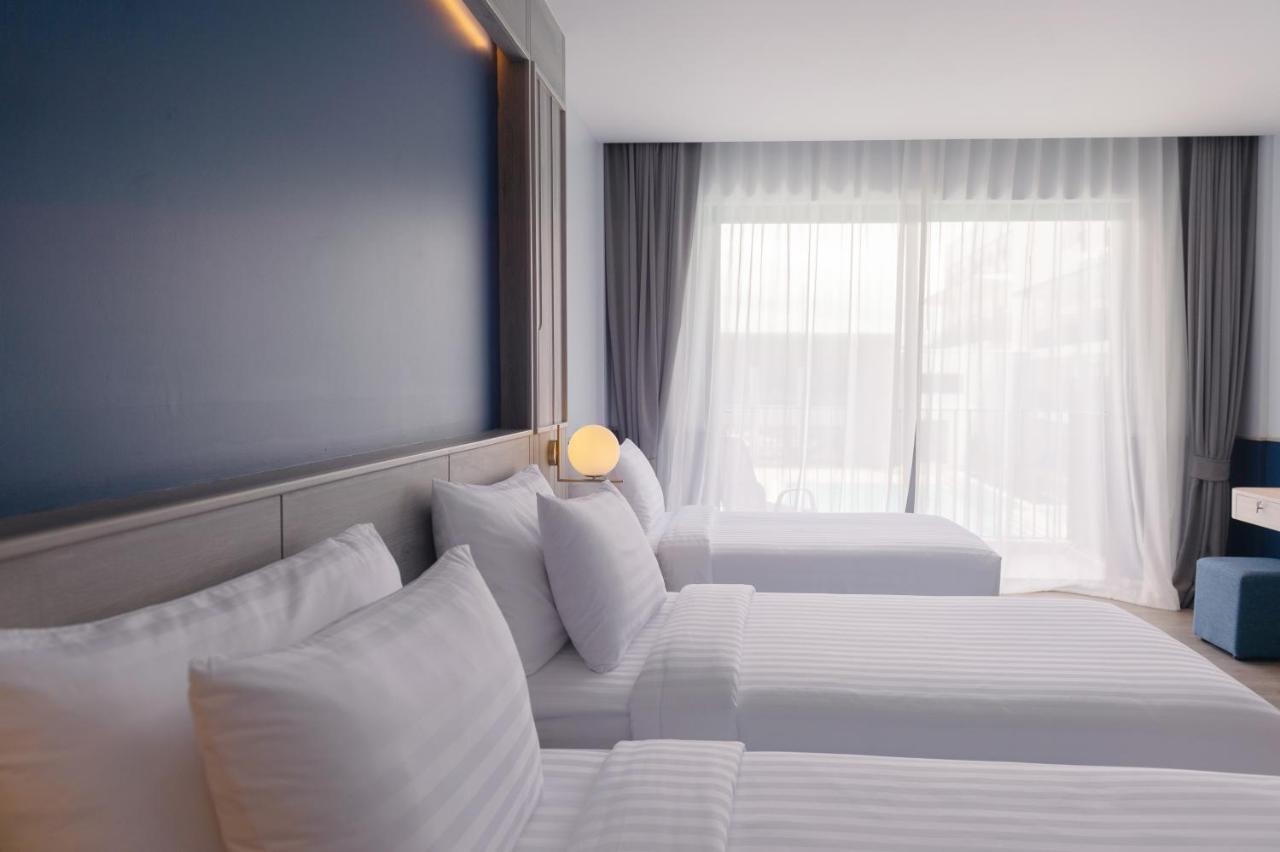 Seabed Grand Hotel Phuket - Sha Extra Plus Exteriör bild A room at the hotel