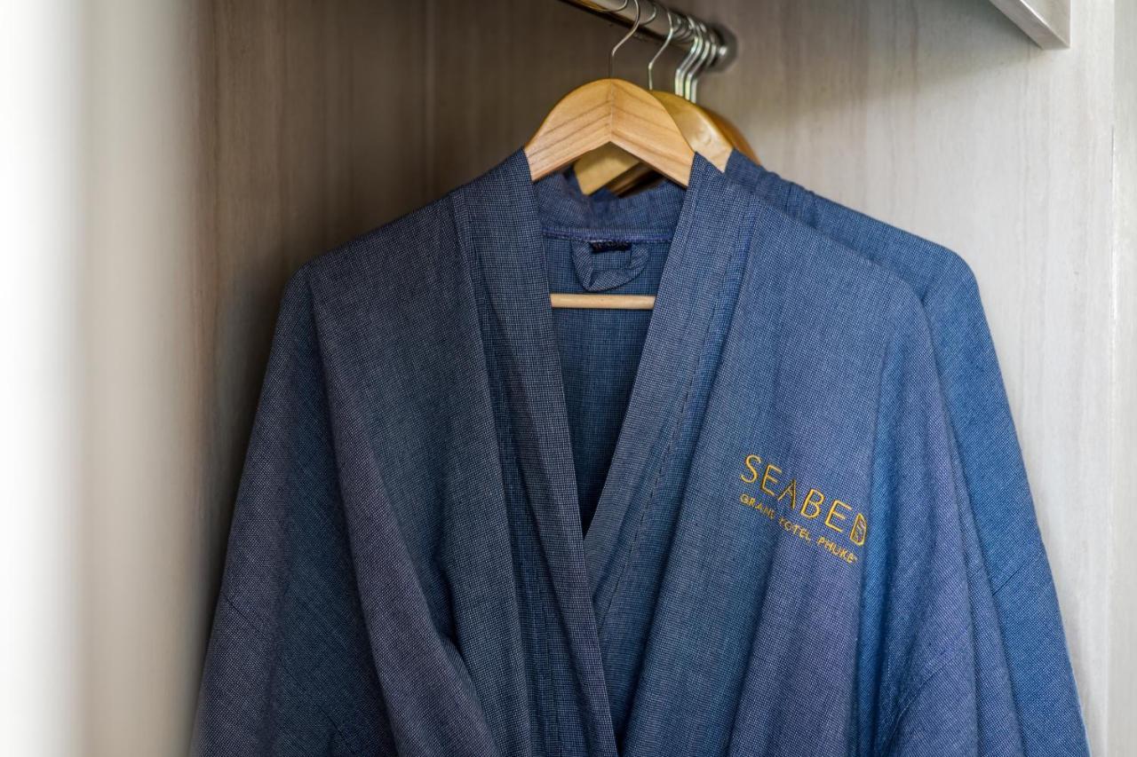 Seabed Grand Hotel Phuket - Sha Extra Plus Exteriör bild A bathrobe